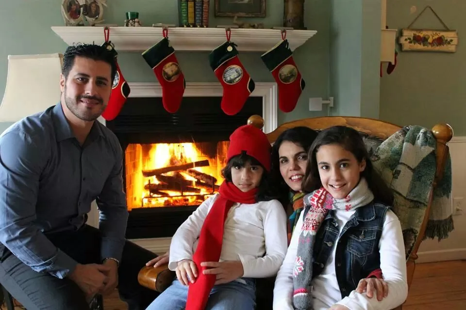 Our family by the fireplace